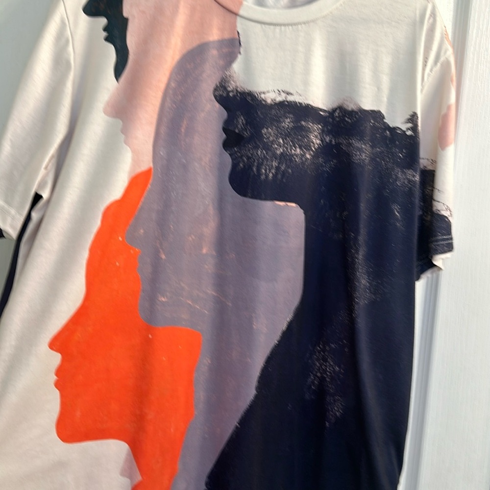 Men’s XL T-shirt with “We are all together in this” theme.